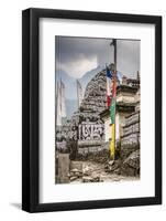 Mani Stones and prayer flags on a trail, Nepal.-Lee Klopfer-Framed Photographic Print