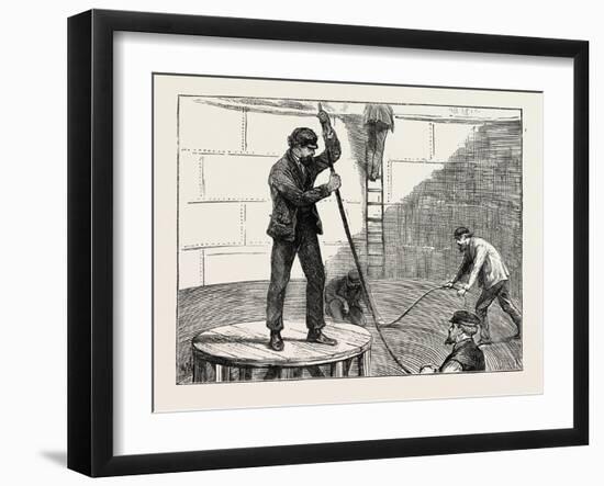 Manufacturing an Electric Telegraph Cable: Coiling Down the Cable in the Tank, 1873-null-Framed Giclee Print