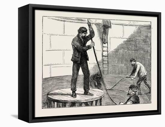 Manufacturing an Electric Telegraph Cable: Coiling Down the Cable in the Tank, 1873-null-Framed Stretched Canvas