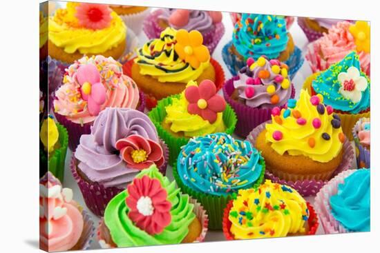 Many Sweet Birthday Cupcakes With Flowers And Butter Cream-Ivonnewierink-Stretched Canvas