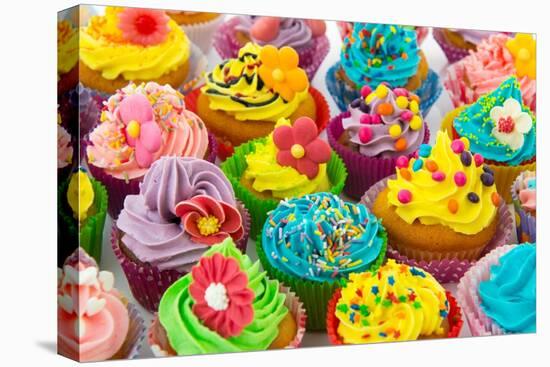 Many Sweet Birthday Cupcakes With Flowers And Butter Cream-Ivonnewierink-Stretched Canvas