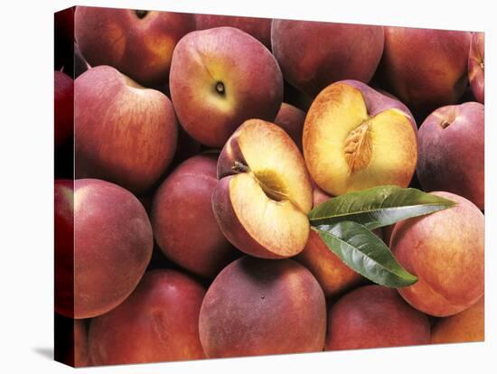 Many Whole Peaches with One Halved-null-Stretched Canvas