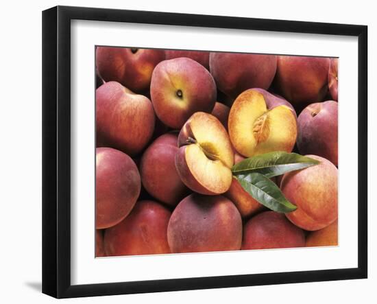 Many Whole Peaches with One Halved-null-Framed Photographic Print