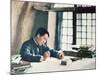 Mao Zedong Writing His 'On Protracted War' in a Cave-Dwelling in Yenan, 1938-Chinese Photographer-Mounted Photographic Print