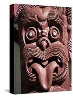 Maori Wooden Carving with Tongue Sticking Out, Rotorua, North Island, New Zealand-D H Webster-Stretched Canvas