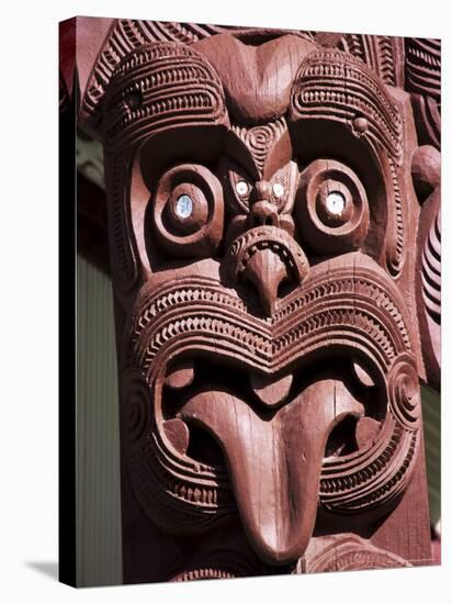 Maori Wooden Carving with Tongue Sticking Out, Rotorua, North Island, New Zealand-D H Webster-Stretched Canvas