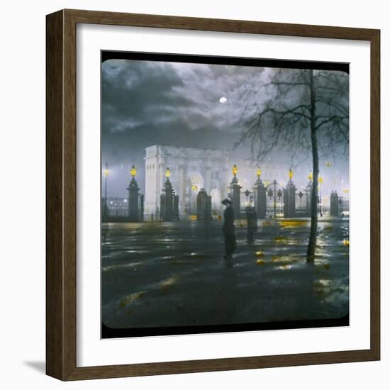 Marble Arch by Night - a Figure Standing in Front of the Park Gates-null-Framed Photographic Print