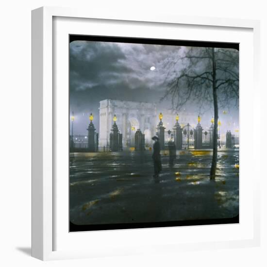 Marble Arch by Night - a Figure Standing in Front of the Park Gates-null-Framed Photographic Print