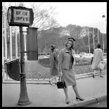 Claudia Cardinale Waiting Near the Champs-Elysées Roundabout, April 1964-Marcel Begoin-Photographic Print