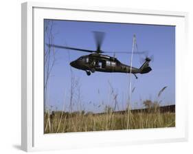 March 31, 2007, a US Army UH-60 Black Hawk Helicopter Prepares to Pick up Soldiers-Stocktrek Images-Framed Photographic Print