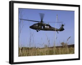 March 31, 2007, a US Army UH-60 Black Hawk Helicopter Prepares to Pick up Soldiers-Stocktrek Images-Framed Photographic Print