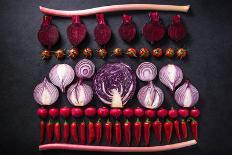 Red Vegetables Cut in Halves, Flat Lay Design on Dark Background, Symmetric-Marcin Jucha-Photographic Print