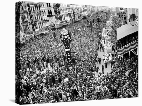 Mardi Gras Revelers Gather at Canal Street-null-Stretched Canvas