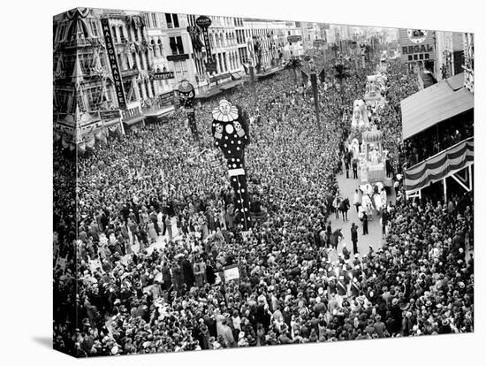 Mardi Gras Revelers Gather at Canal Street-null-Stretched Canvas