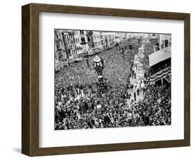 Mardi Gras Revelers Gather at Canal Street-null-Framed Photographic Print