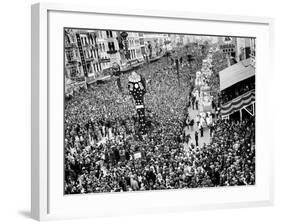 Mardi Gras Revelers Gather at Canal Street-null-Framed Photographic Print