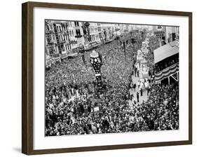 Mardi Gras Revelers Gather at Canal Street-null-Framed Photographic Print