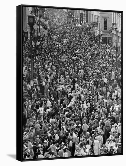 Mardi Gras Revelers Gather at St. Charles Street-null-Framed Stretched Canvas