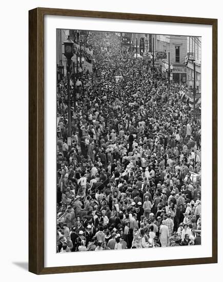 Mardi Gras Revelers Gather at St. Charles Street-null-Framed Premium Photographic Print