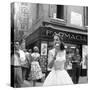 Maria Félix Eating an Ice Cream in Front of a Pharmacy-null-Stretched Canvas