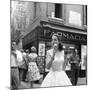 Maria Félix Eating an Ice Cream in Front of a Pharmacy-null-Mounted Photographic Print