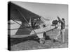 Marie Goerke Sitting in the Plane While the Instructor Kenny Garofalo Stops the Propellor-Bernard Hoffman-Stretched Canvas