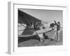 Marie Goerke Sitting in the Plane While the Instructor Kenny Garofalo Stops the Propellor-Bernard Hoffman-Framed Photographic Print