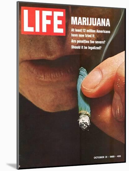 Marijuana, Man with Joint by his Mouth, October 31, 1969-Co Rentmeester-Mounted Photographic Print