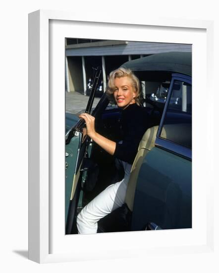 Marilyn Monroe Getting Out of a Car-Alfred Eisenstaedt-Framed Premium Photographic Print