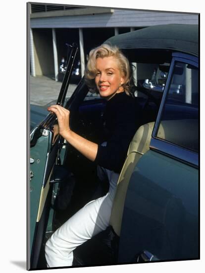 Marilyn Monroe Getting Out of a Car-Alfred Eisenstaedt-Mounted Premium Photographic Print