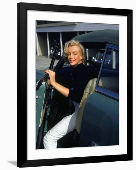 Marilyn Monroe Getting Out of a Car-Alfred Eisenstaedt-Framed Premium Photographic Print