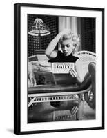 Marilyn Monroe Reading Motion Picture Daily, New York, c.1955-Ed Feingersh-Framed Art Print