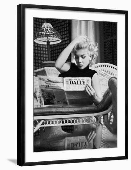 Marilyn Monroe Reading Motion Picture Daily, New York, c.1955-Ed Feingersh-Framed Art Print