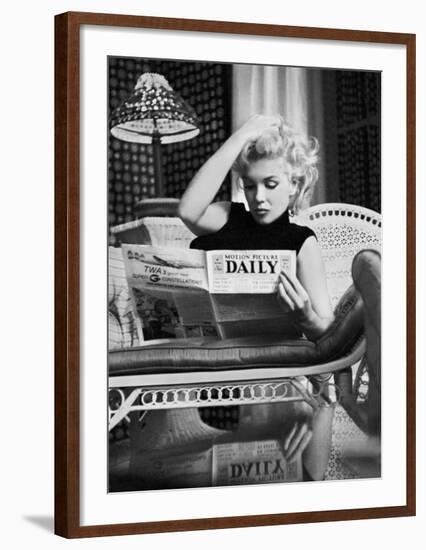 Marilyn Monroe Reading Motion Picture Daily, New York, c.1955-Ed Feingersh-Framed Art Print