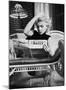 Marilyn Monroe Reading Motion Picture Daily, New York, c.1955-Ed Feingersh-Mounted Art Print