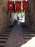 Medieval Flags Above Stone Walkway, Assisi, Umbria, Italy-Marilyn Parver-Photographic Print