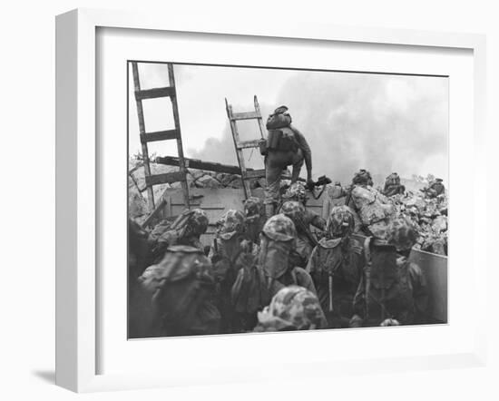 Marine Lt. Baldomero Lopez Scaling a Seawall after Landing on Red Beach in the Invasion of Inchon-null-Framed Photo