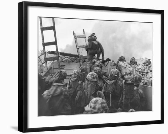 Marine Lt. Baldomero Lopez Scaling a Seawall after Landing on Red Beach in the Invasion of Inchon-null-Framed Photo