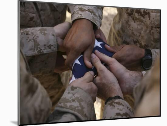 Marines Fold an American Flag after It was Raised in Memory of a Fallen Soldier-Stocktrek Images-Mounted Photographic Print
