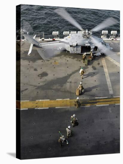 Marines Prepare to Board an MH-60S Sea Hawk Helicopter Aboard USS Peleliu-Stocktrek Images-Stretched Canvas