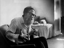 American Poet John Berryman Expressing Himself While Sitting in His Semi Empty Apartment-Mark Kauffman-Premium Photographic Print
