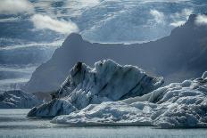 Iceland, floating glaciers form blue ice sculptures in Jokulsarlon, glacier lagoon.-Mark Williford-Photographic Print