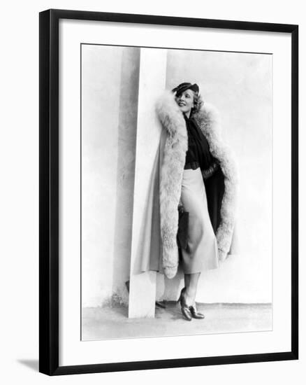 Marlene Dietrich, in a Brown and Beige Suit and Lynx-Trimmed Beige Wool Cape by Travis Banton, 1935-null-Framed Photo