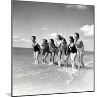 Marquis De Cuevas" Company on the Beach at Deauville: 7 Girls, 7 Nationalities-null-Mounted Photographic Print