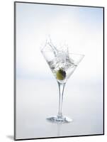 Martini with Green Olive (Splash)-Klaus Arras-Mounted Photographic Print