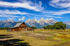 Scenic View of Grand Teton with Old Wooden Farm-MartinM303-Photographic Print