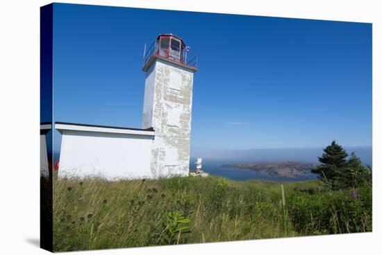 Martins, New Brunswick, White Old Traditional Historic Lighthouse Ion Water with Fields on Cliff-Bill Bachmann-Stretched Canvas
