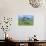 Masai Giraffe Grazing on the Serengeti with Acacia Tree and Clouds-John Alves-Photographic Print displayed on a wall