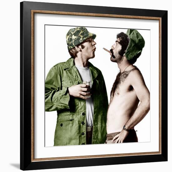 MASH, (aka M*A*S*H), from left: Donald Sutherland, Elliot Gould, 1970.-null-Framed Photo