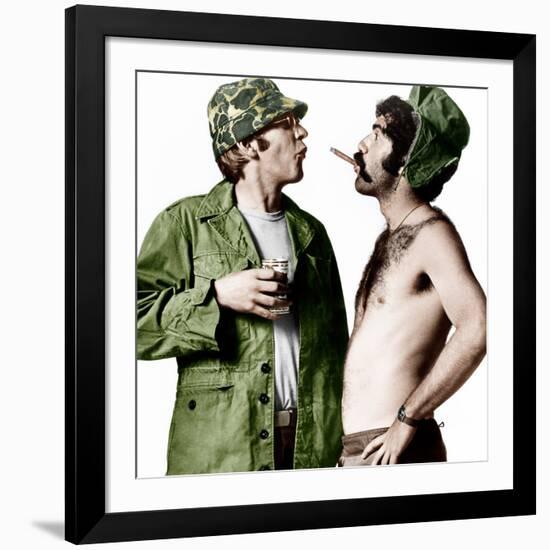 MASH, (aka M*A*S*H), from left: Donald Sutherland, Elliot Gould, 1970.-null-Framed Photo